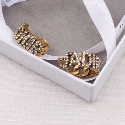 Boucles d'oreilles créoles avec lettres en or et argent, accessoires de luxe et de mode, tendance, 2022